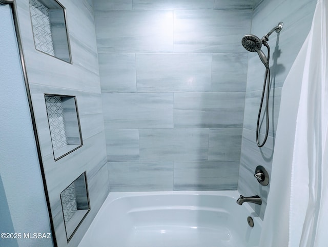 full bathroom with shower / tub combo