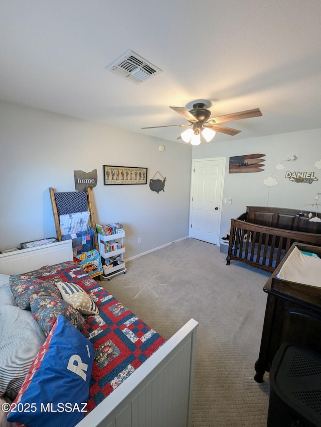 bedroom featuring ceiling fan, carpet floors, and visible vents