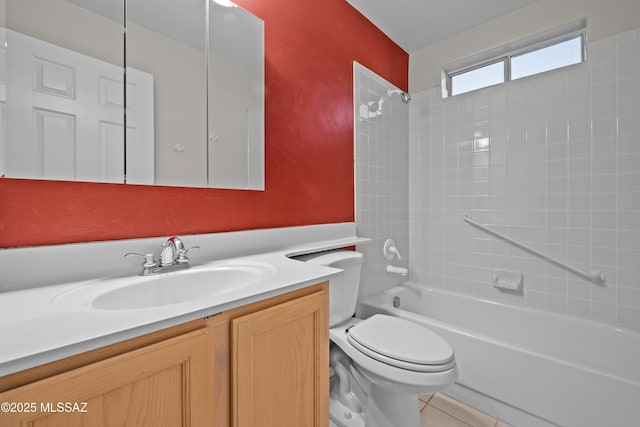 full bathroom with tile patterned flooring, tub / shower combination, vanity, and toilet