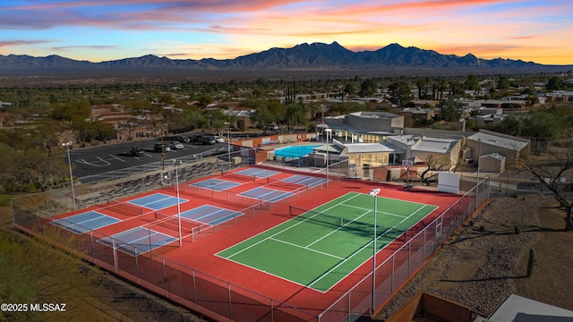 drone / aerial view featuring a mountain view