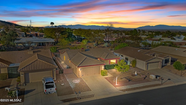 aerial view featuring a residential view and a mountain view