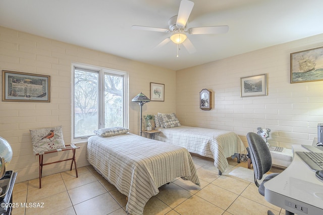 bedroom featuring light tile patterned floors and ceiling fan