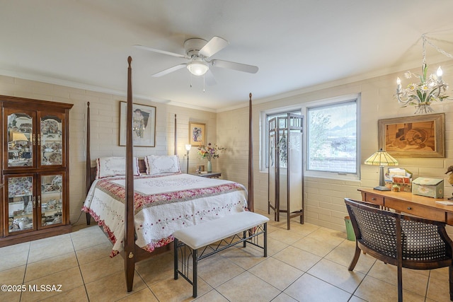 bedroom with light tile patterned floors, ceiling fan with notable chandelier, and crown molding