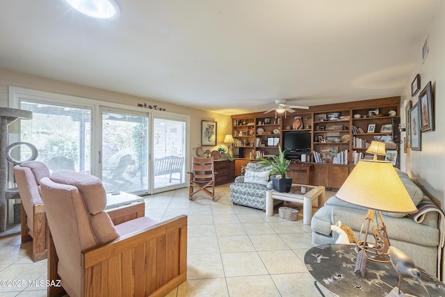 living room featuring light tile patterned floors, visible vents, and a ceiling fan