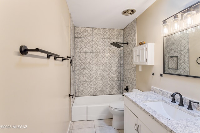 bathroom with bathing tub / shower combination, visible vents, toilet, vanity, and tile patterned floors