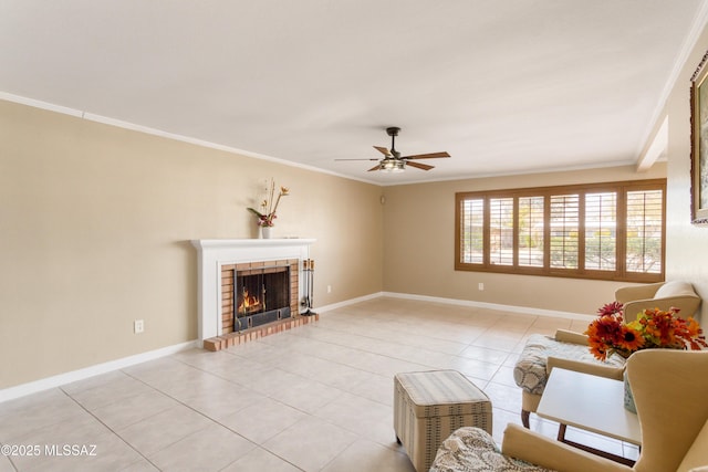 living room with a brick fireplace, crown molding, baseboards, and light tile patterned floors