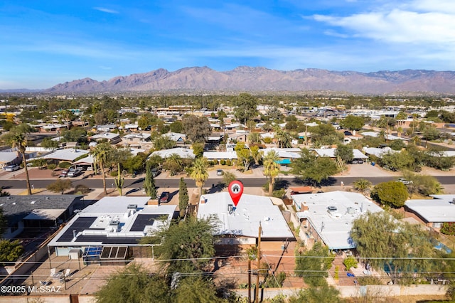 birds eye view of property with a residential view and a mountain view