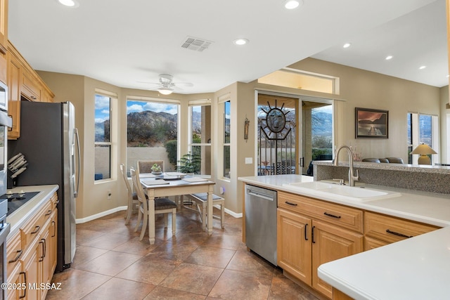 kitchen featuring visible vents, a sink, recessed lighting, appliances with stainless steel finishes, and ceiling fan