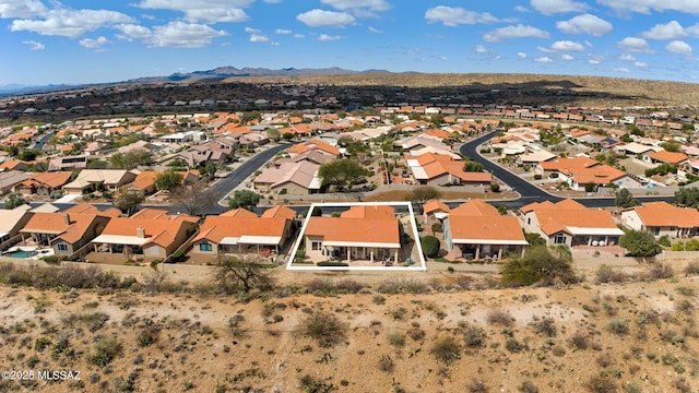 birds eye view of property featuring a residential view and a mountain view