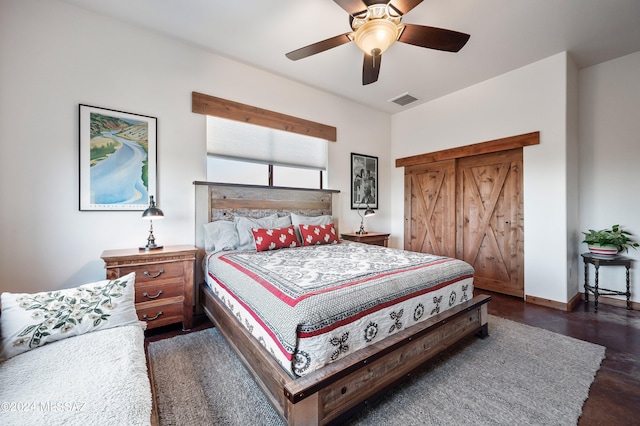 bedroom featuring visible vents, baseboards, and ceiling fan