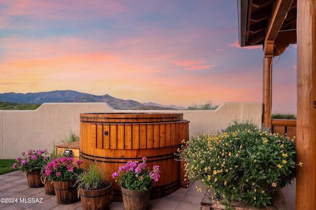 view of patio / terrace featuring a mountain view