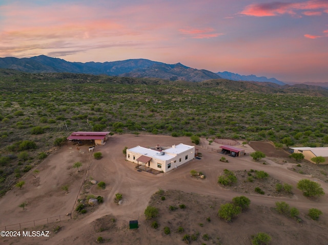 aerial view at dusk with a mountain view