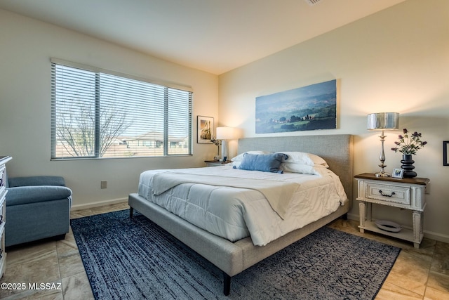 bedroom with baseboards