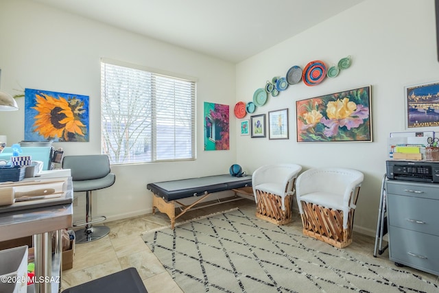 recreation room featuring baseboards