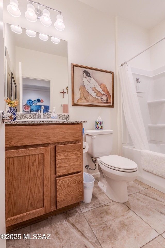 bathroom with shower / tub combo, vanity, and toilet