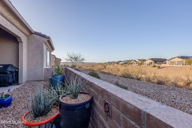 view of yard featuring a residential view