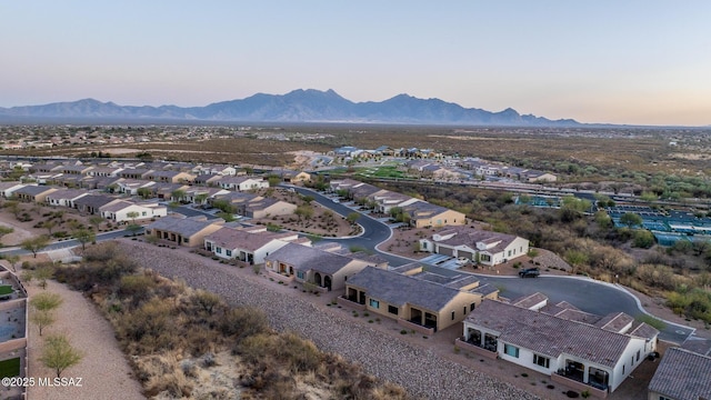 birds eye view of property featuring a residential view and a mountain view