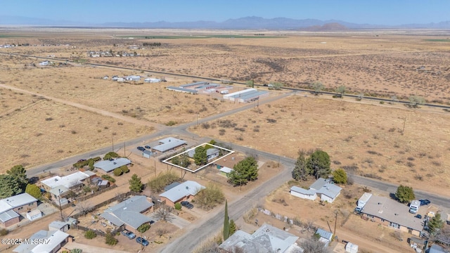 bird's eye view with a mountain view, a desert view, and a rural view