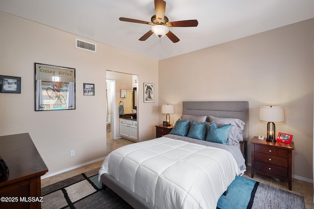 bedroom with a ceiling fan, baseboards, visible vents, and connected bathroom