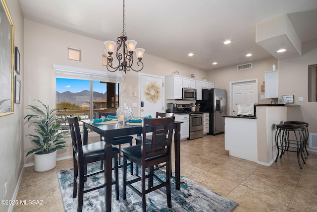 dining room featuring a notable chandelier, recessed lighting, visible vents, and baseboards