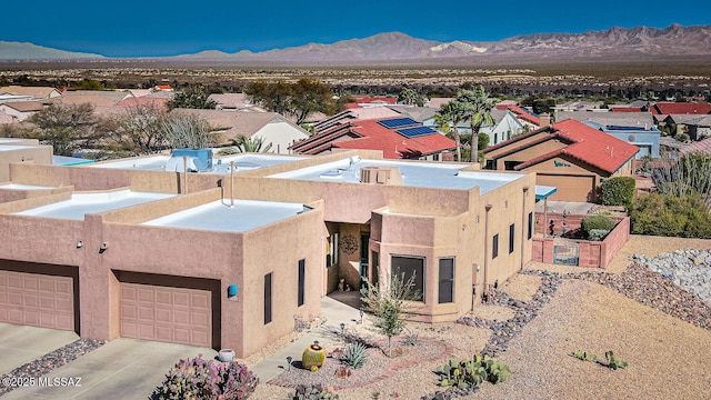 bird's eye view with a mountain view and a residential view