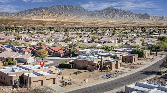 drone / aerial view with a mountain view and a residential view