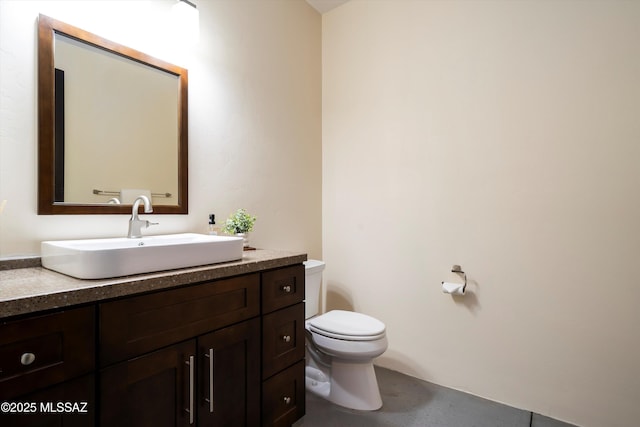 half bath with toilet and vanity