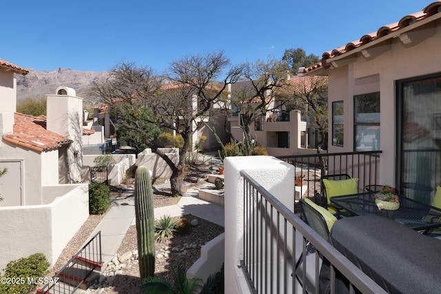 balcony featuring a residential view