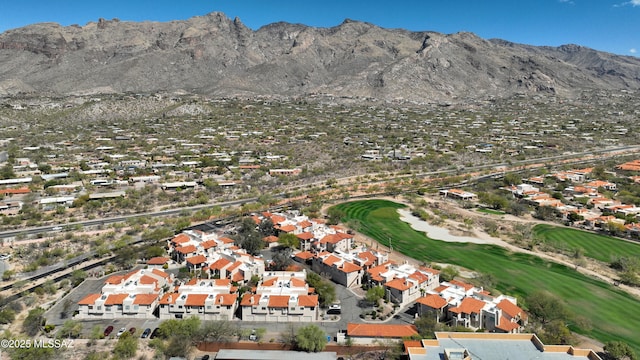 bird's eye view featuring view of golf course, a residential view, and a mountain view