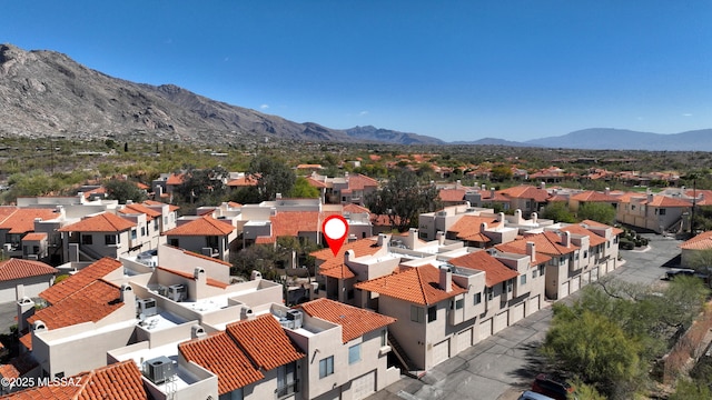 drone / aerial view with a residential view and a mountain view