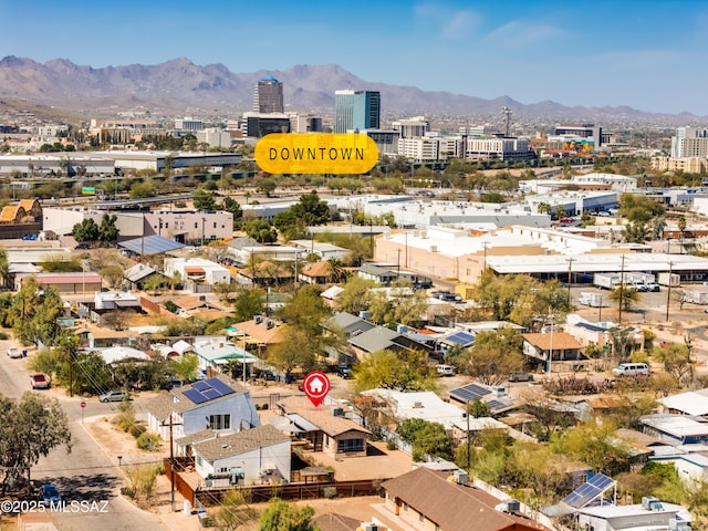 drone / aerial view with a city view and a mountain view