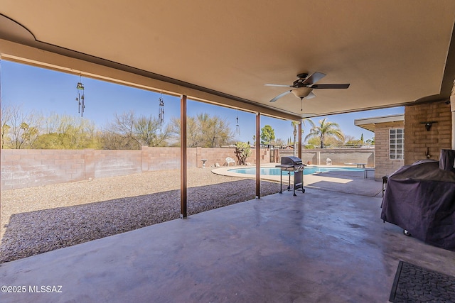 view of patio / terrace featuring a fenced backyard, a fenced in pool, grilling area, and a ceiling fan