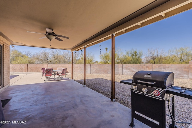 view of patio / terrace featuring a fenced backyard, a grill, and ceiling fan