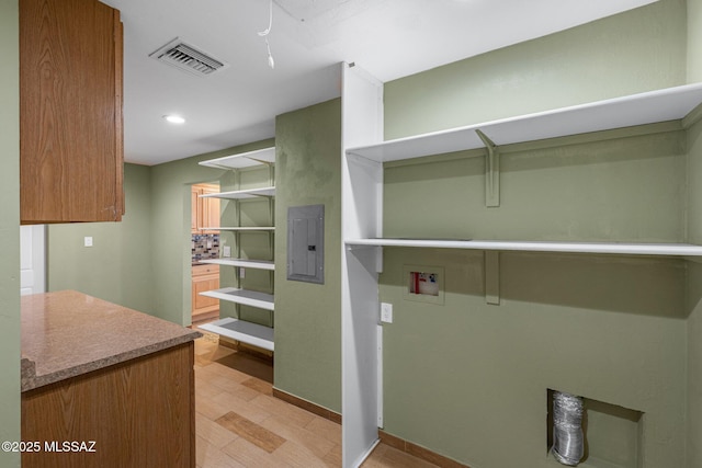 washroom featuring hookup for a washing machine, recessed lighting, laundry area, visible vents, and electric panel