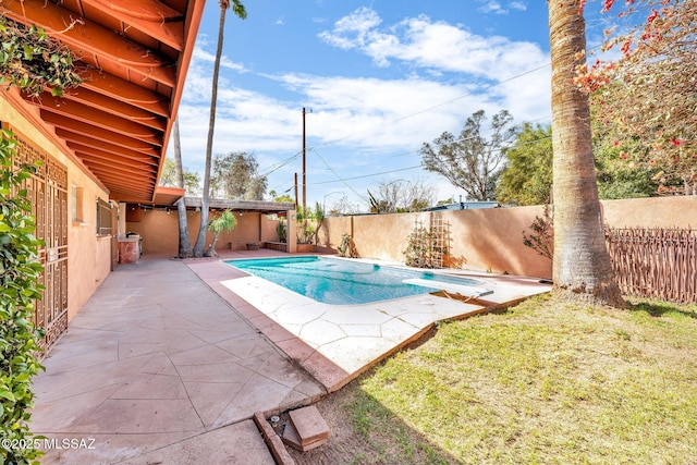 view of swimming pool with a patio, a fenced backyard, and a fenced in pool