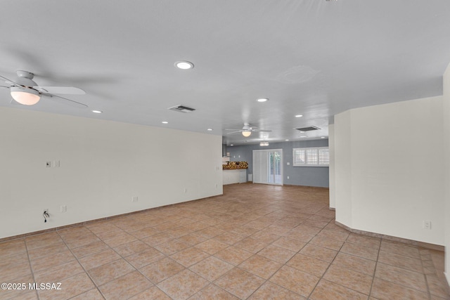 unfurnished living room with light tile patterned floors, recessed lighting, visible vents, and a ceiling fan