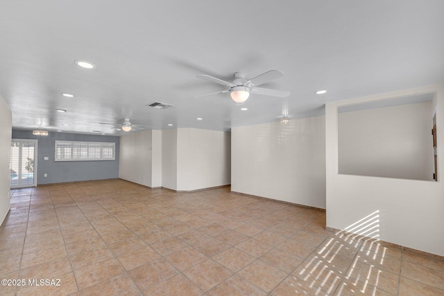 spare room featuring visible vents, a ceiling fan, and recessed lighting