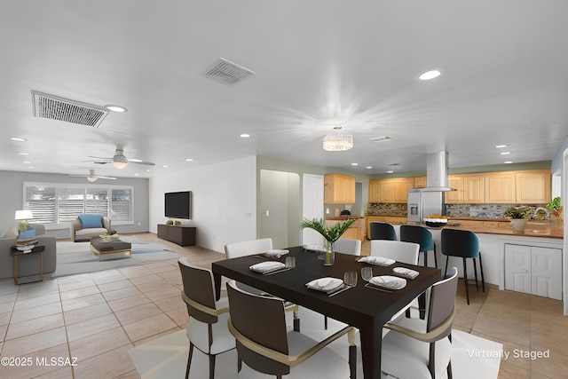 dining area featuring light tile patterned floors, ceiling fan, visible vents, and recessed lighting