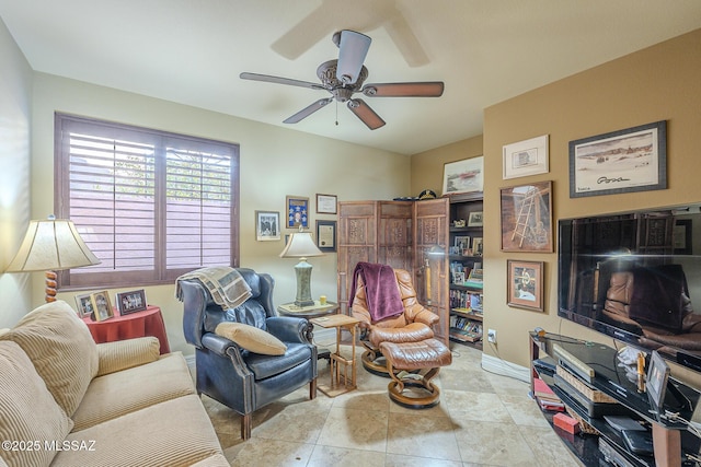 living room with ceiling fan