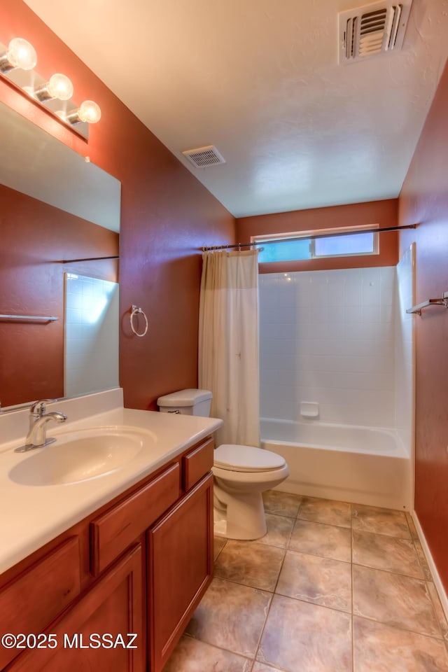 full bath with visible vents, vanity, toilet, and tile patterned floors