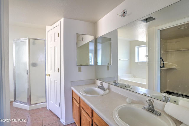 3381 W Calle De La Bajada, Tucson, AZ 85746 - full bath featuring a stall shower, tile patterned floors, double vanity, and a bath