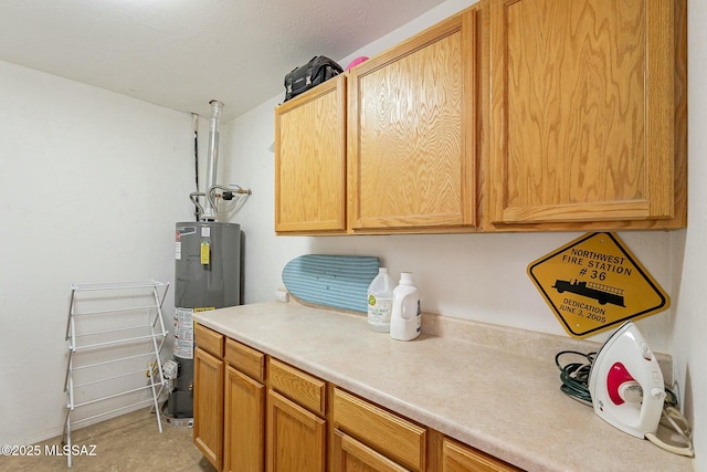 laundry area featuring water heater