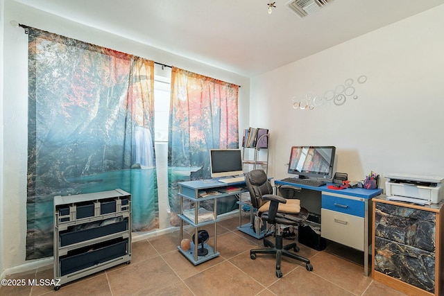 home office featuring tile patterned flooring and visible vents