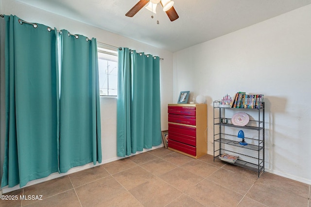 interior space featuring a ceiling fan