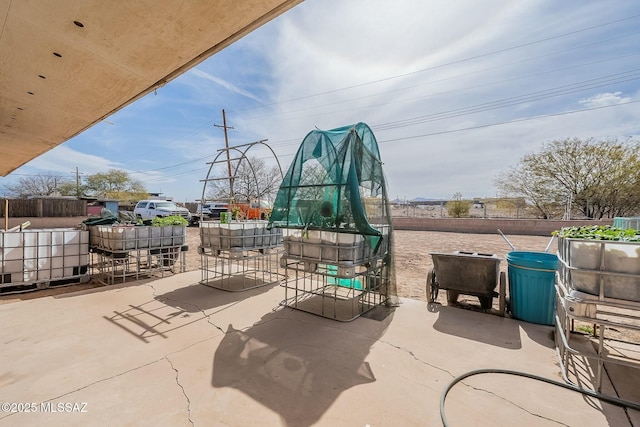 view of patio with fence