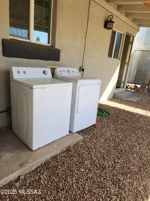 laundry area featuring laundry area and independent washer and dryer