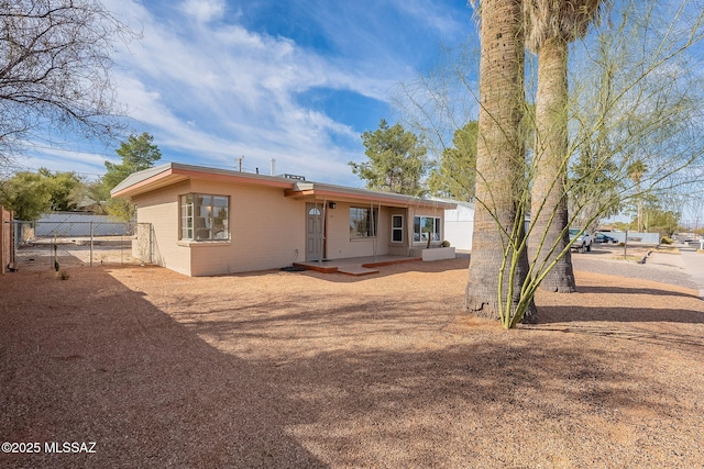 view of front of home with fence