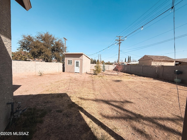 1785 Camilla Cir, Safford, AZ 85546 - view of yard with a storage shed, a fenced backyard, and an outdoor structure