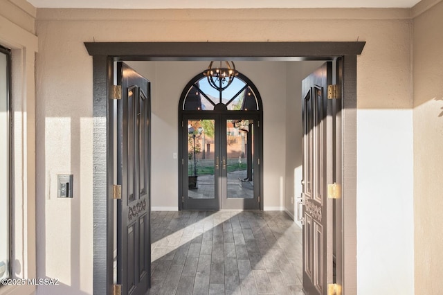 entrance to property featuring french doors