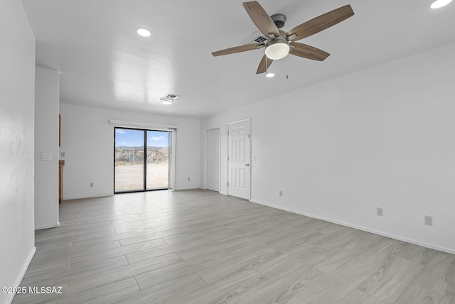 unfurnished room featuring ceiling fan, recessed lighting, light wood-type flooring, and baseboards